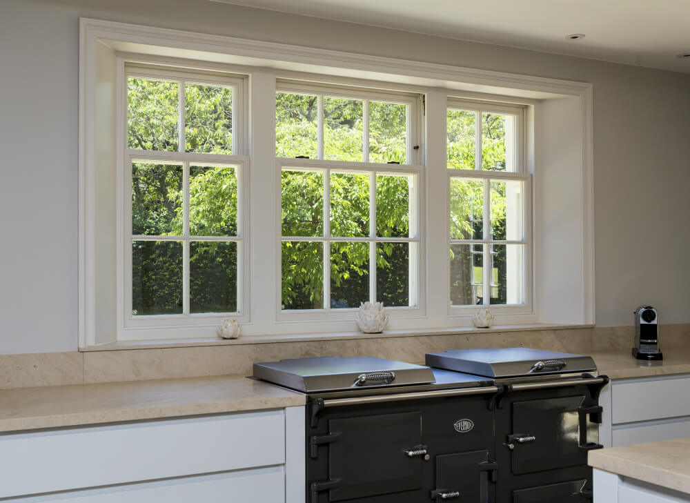 interior view of a Timber box sash window seen from a sunny kitchen 