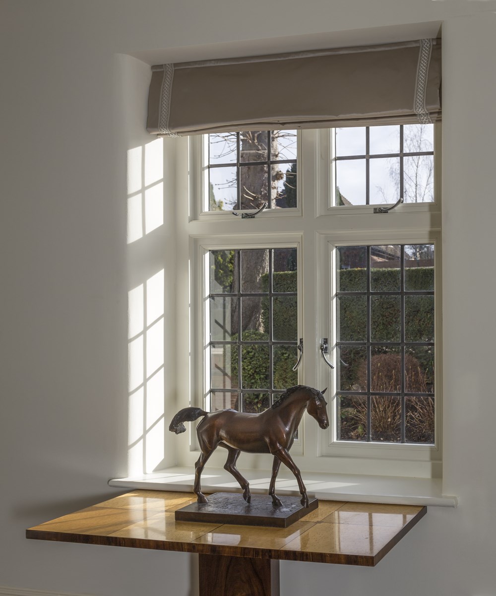 Interior of a beautiful home in Hampsted featuring the interior of a wooden casement window